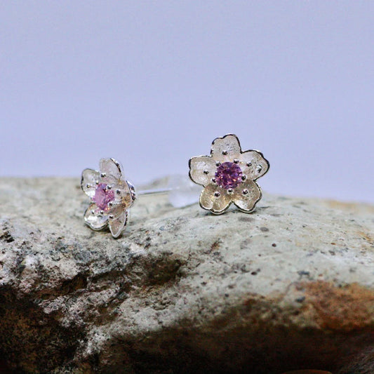Aretes tipo Topo con diseño de flores Morado