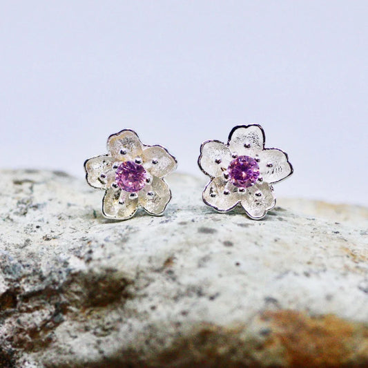 Aretes tipo Topo con diseño de flores Morado